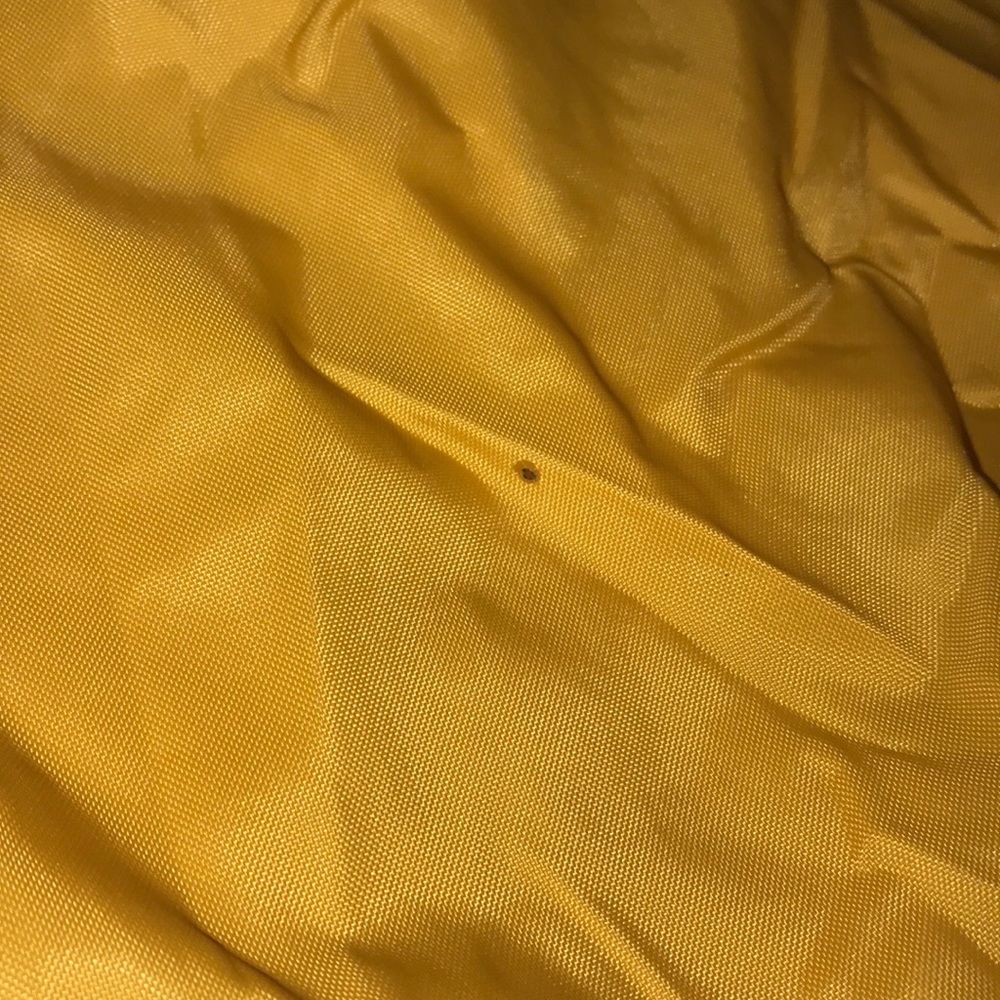 This is a yellow Nike windbreaker - Picture 5 of 5